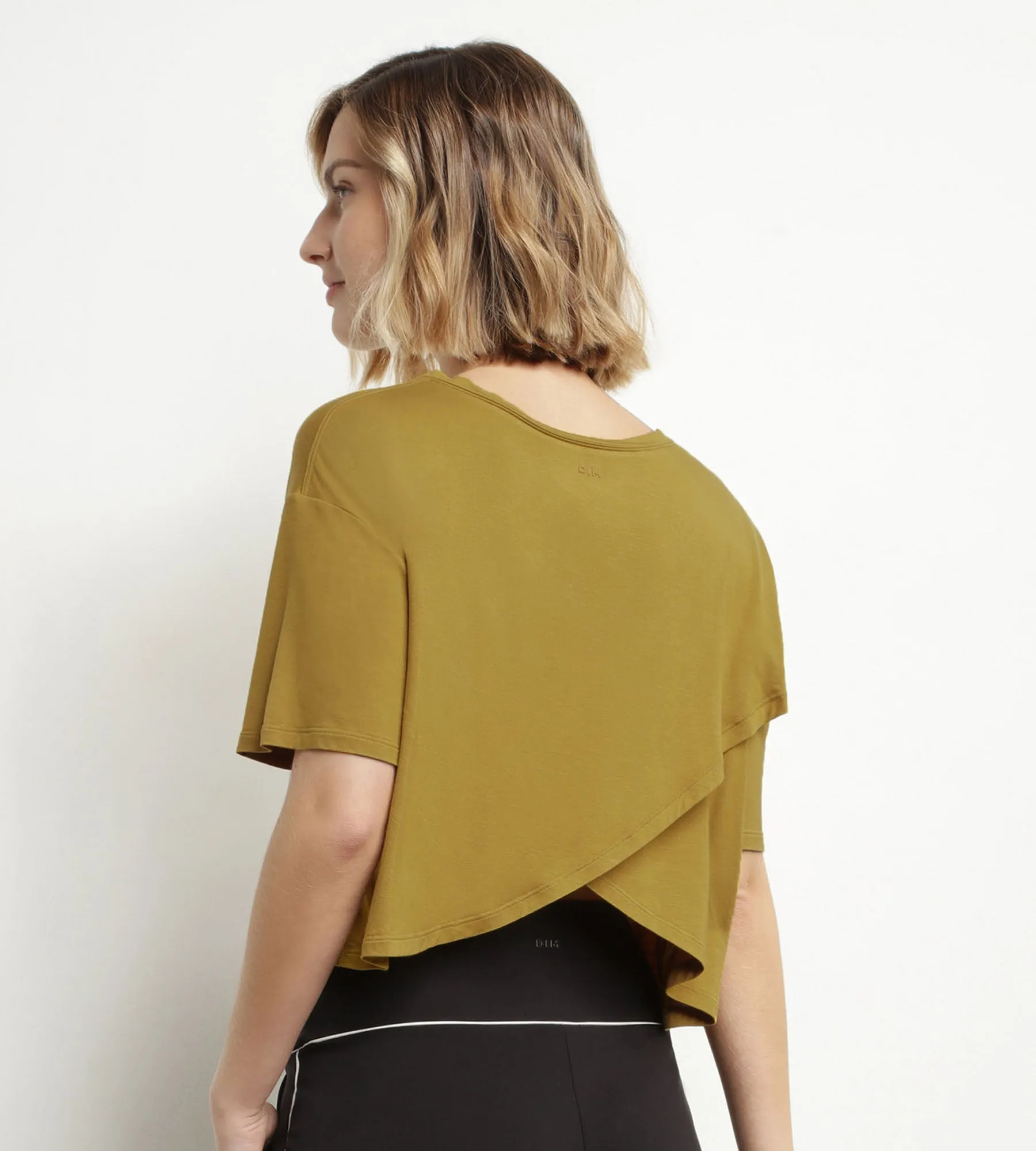 Women's sports T-shirt in olive green viscose with open back Dim Move
